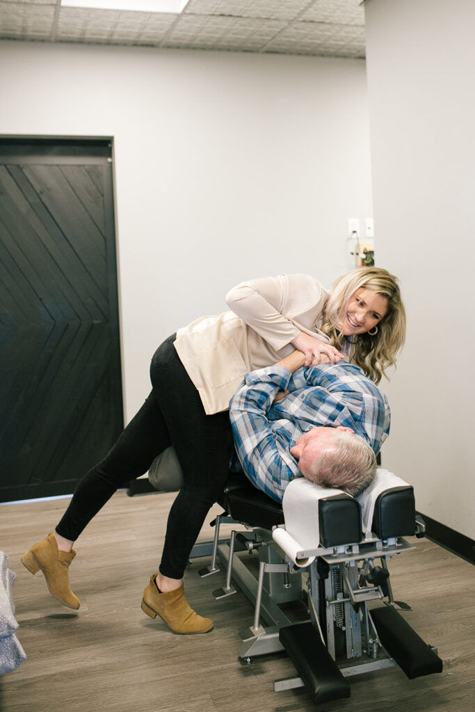 impact chiropractor with patient in fort collins 